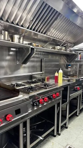 Restaurant cooking line with stainless steel commercial kitchen equipment in Bangalore